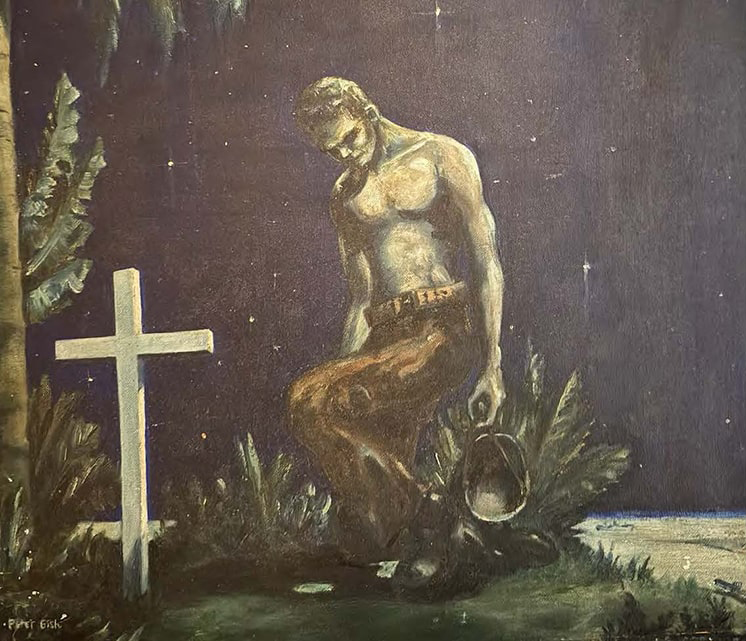 Soldier kneeling at grave